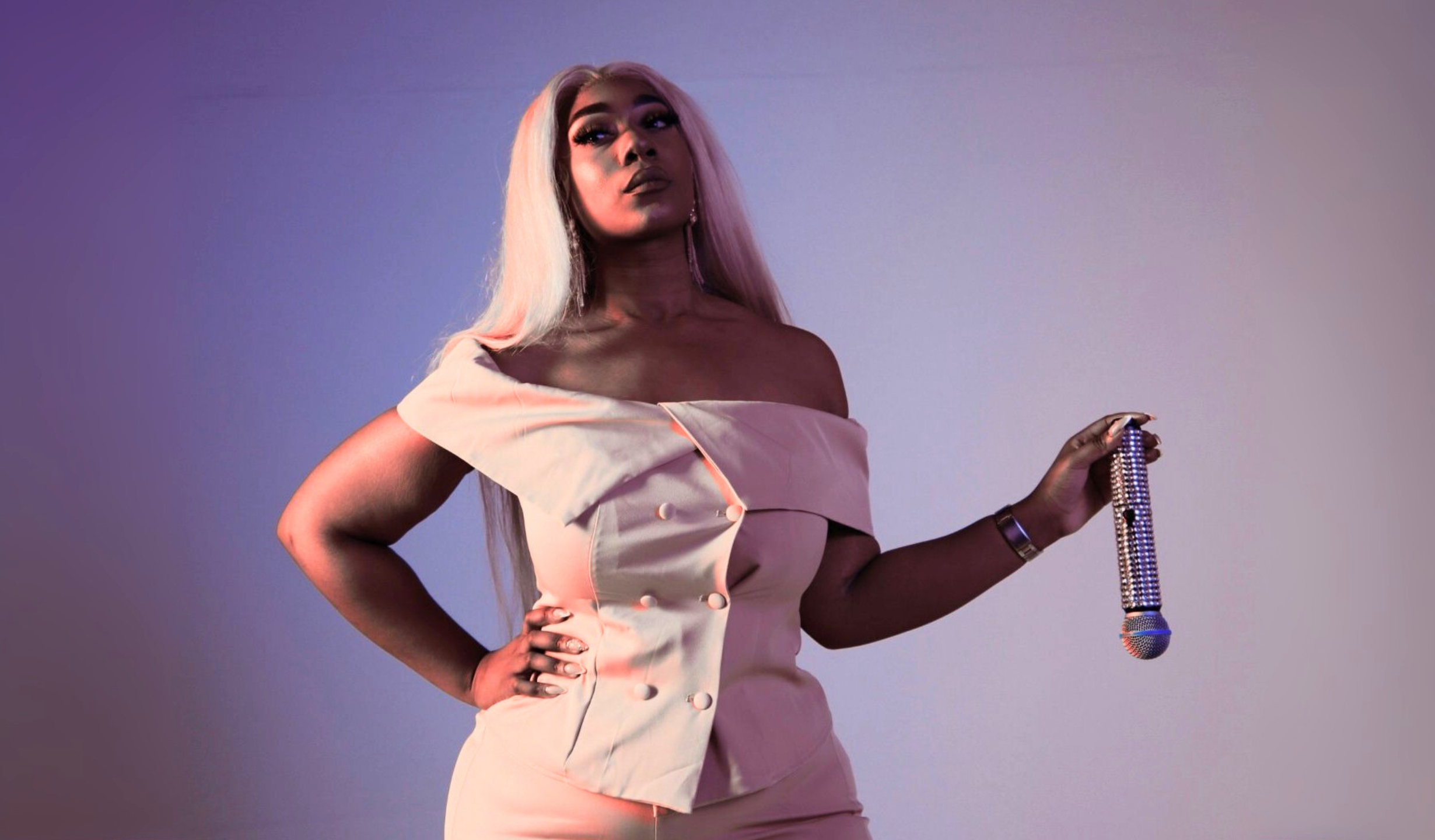 Georgy Morhea with bedazzled microphone